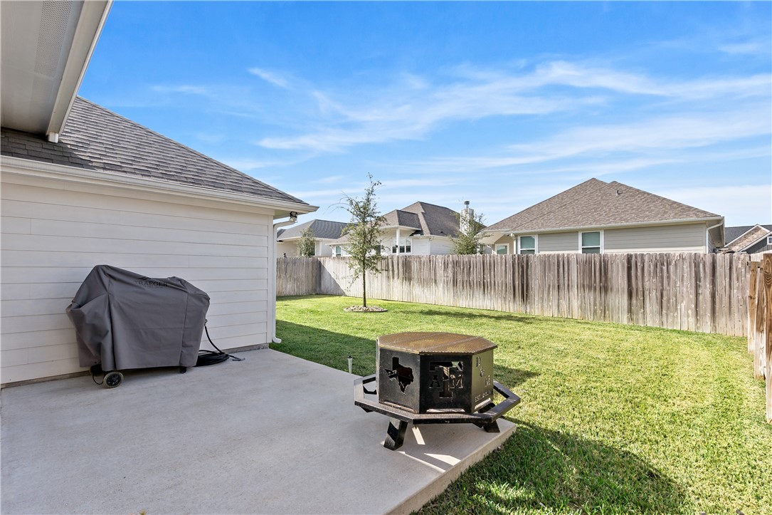 3161 Normandy Way Bryan, TX 77808 - Photo 25 of 27 a view of a house with backyard and sitting area