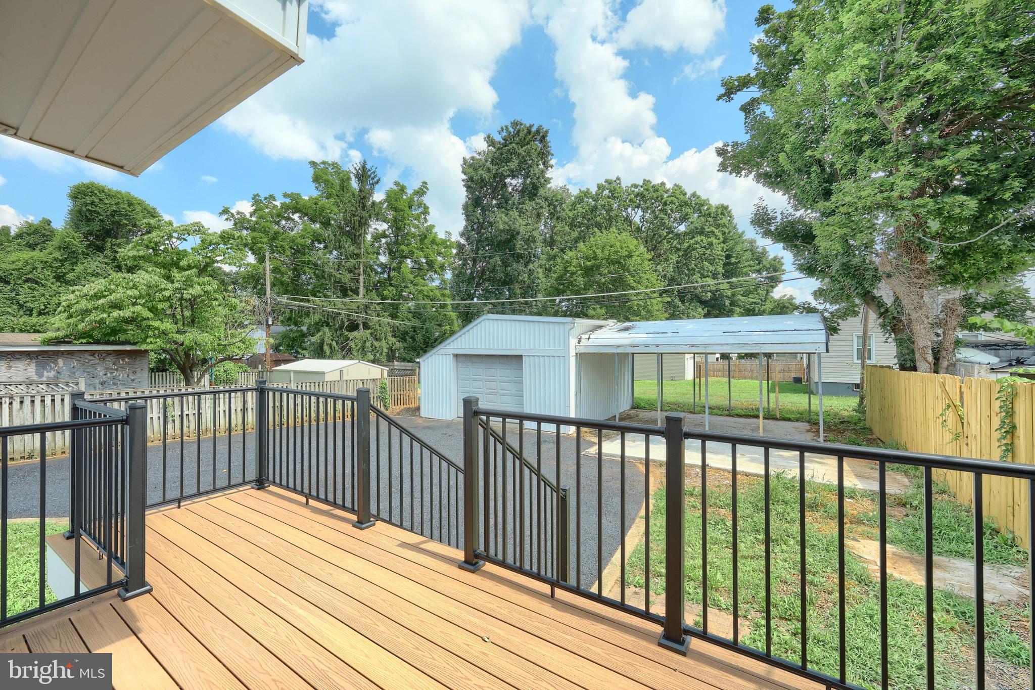 6414 Liberty Road Baltimore, MD 21207 - Photo 11 of 54 a view of a wooden roof deck