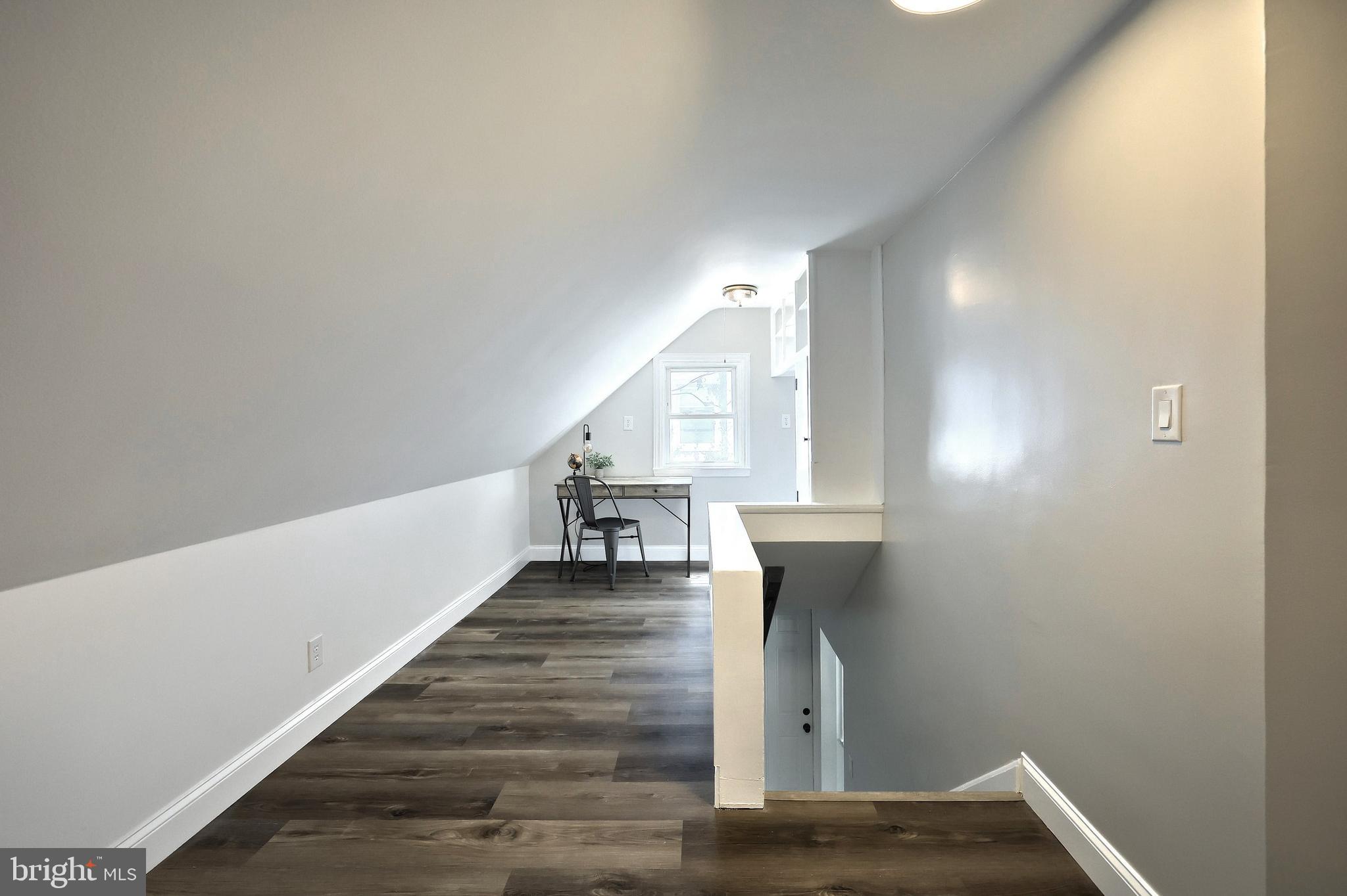 6414 Liberty Road Baltimore, MD 21207 - Photo 30 of 54 a view of entryway and hall with wooden floor