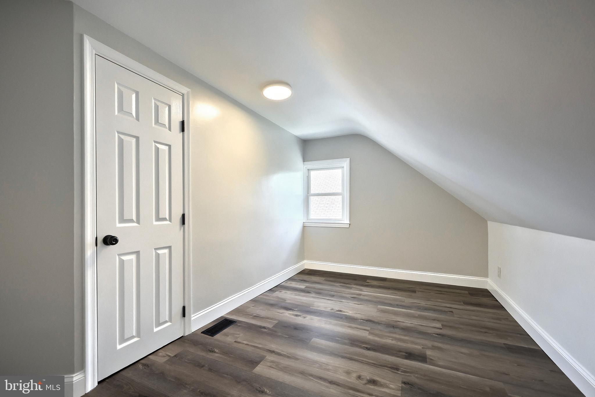 6414 Liberty Road Baltimore, MD 21207 - Photo 33 of 54 a view of an entryway with wooden floor