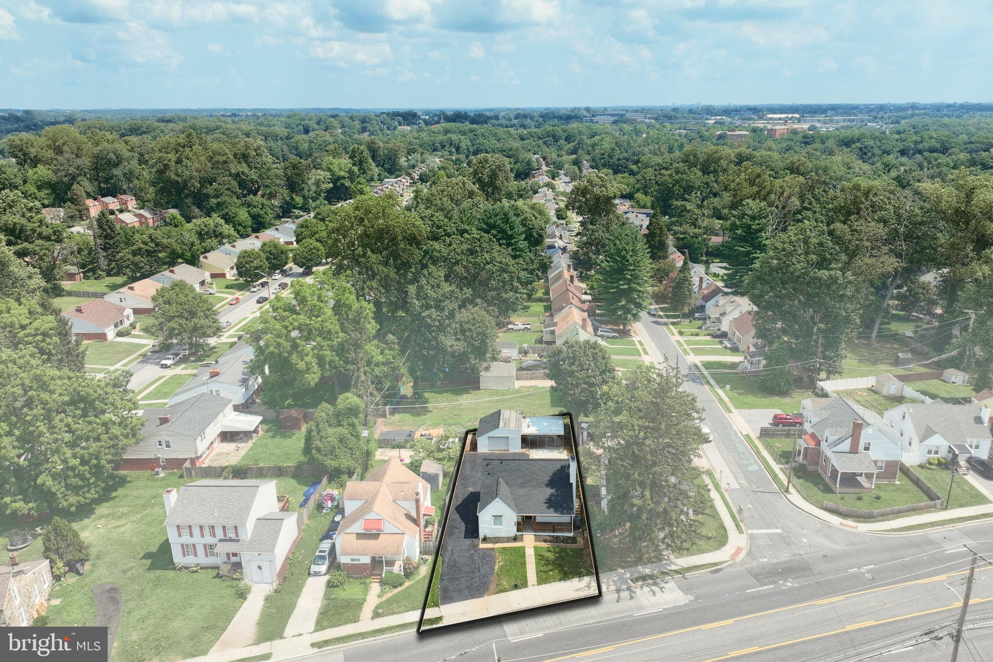6414 Liberty Road Baltimore, MD 21207 - Photo 4 of 54 an aerial view of a house with a yard