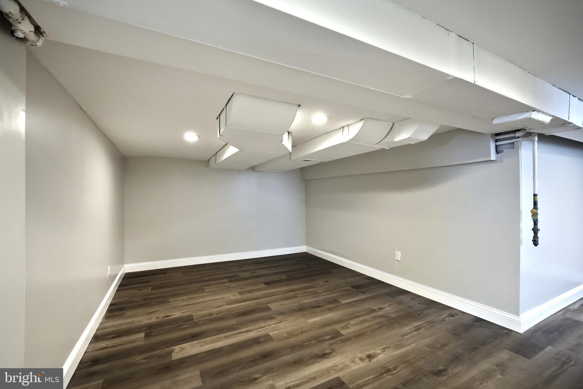 6414 Liberty Road Baltimore, MD 21207 - Photo 41 of 54 wooden floor in an empty room