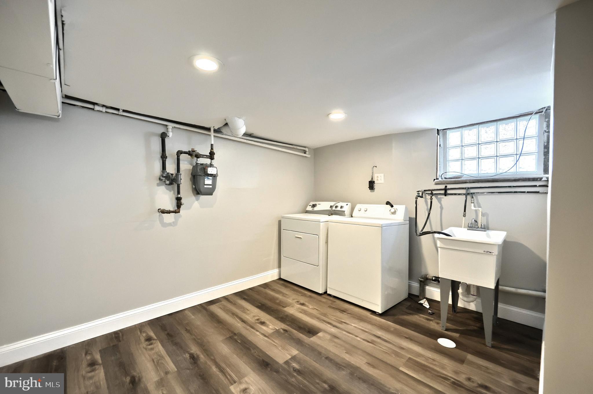 6414 Liberty Road Baltimore, MD 21207 - Photo 42 of 54 a view of a room with workspace and wooden floor
