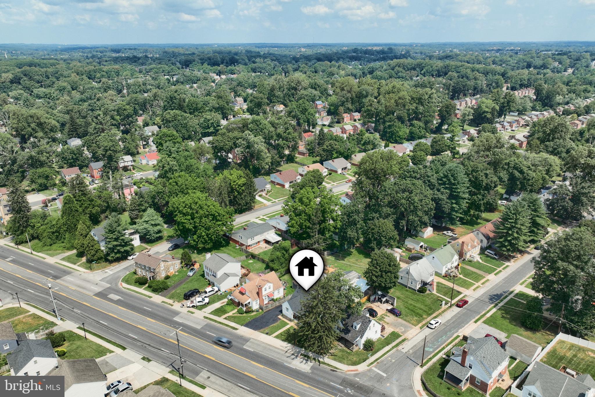 6414 Liberty Road Baltimore, MD 21207 - Photo 46 of 54 an aerial view of a house with a yard
