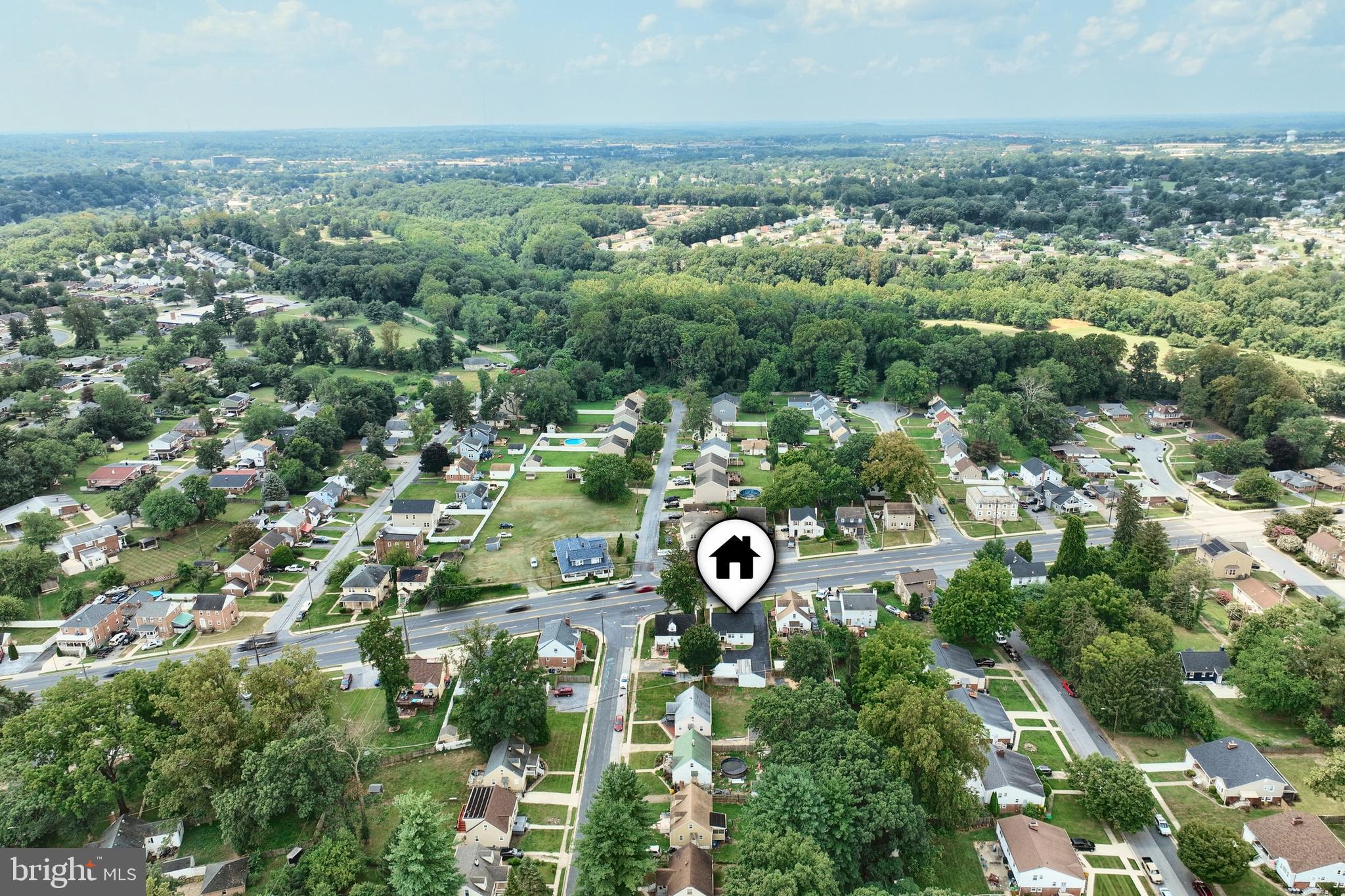 6414 Liberty Road Baltimore, MD 21207 - Photo 50 of 54 an aerial view of residential house with outdoor space and trees all around