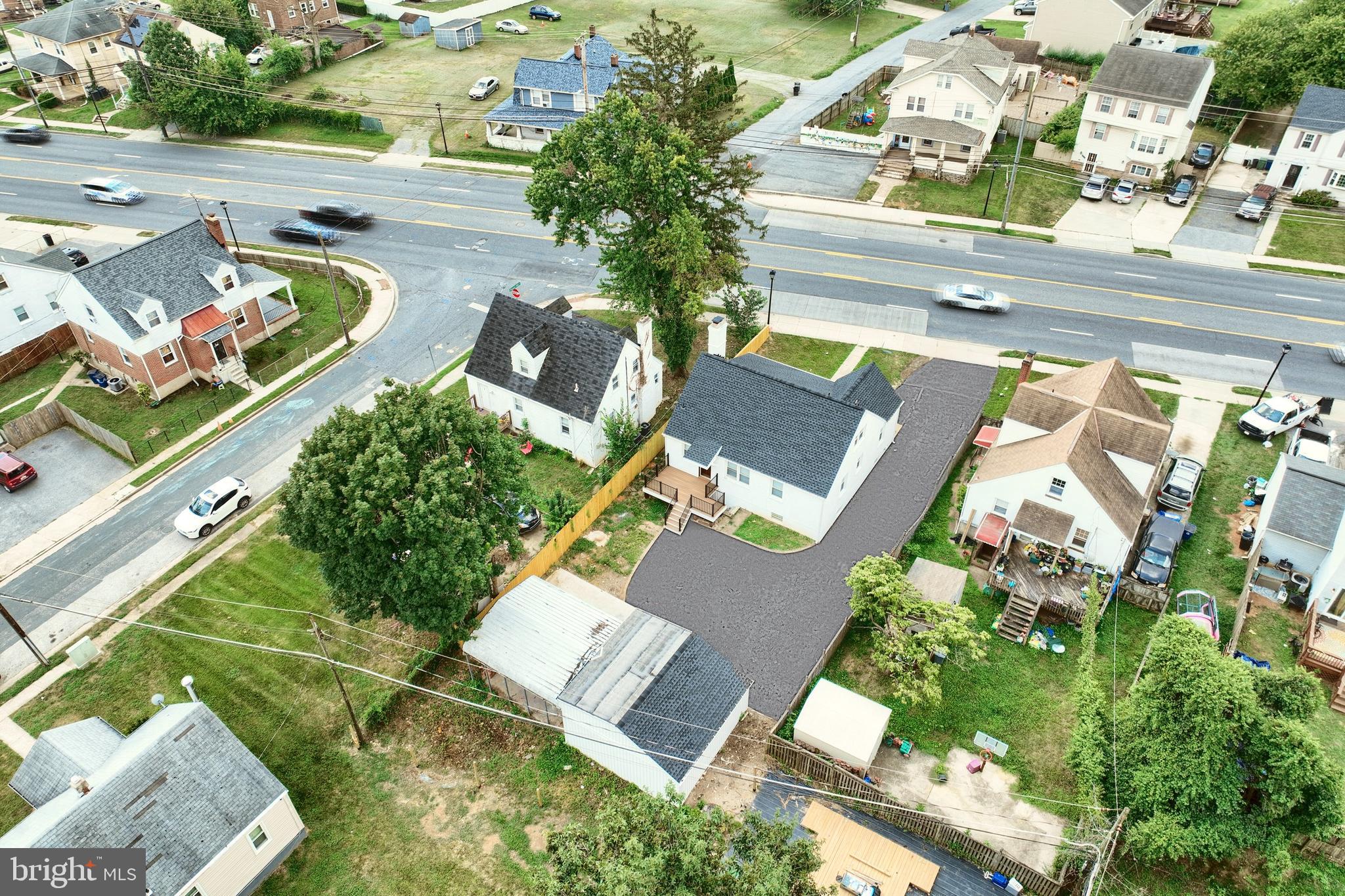 6414 Liberty Road Baltimore, MD 21207 - Photo 6 of 54 an aerial view of a house with a garden