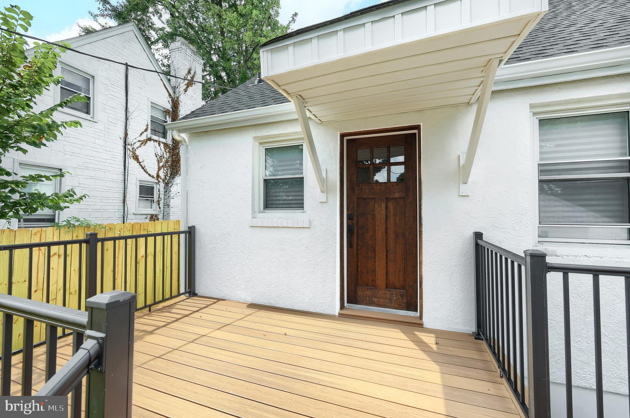 6414 Liberty Road Baltimore, MD 21207 - Photo 10 of 54 a view of a house with wooden deck