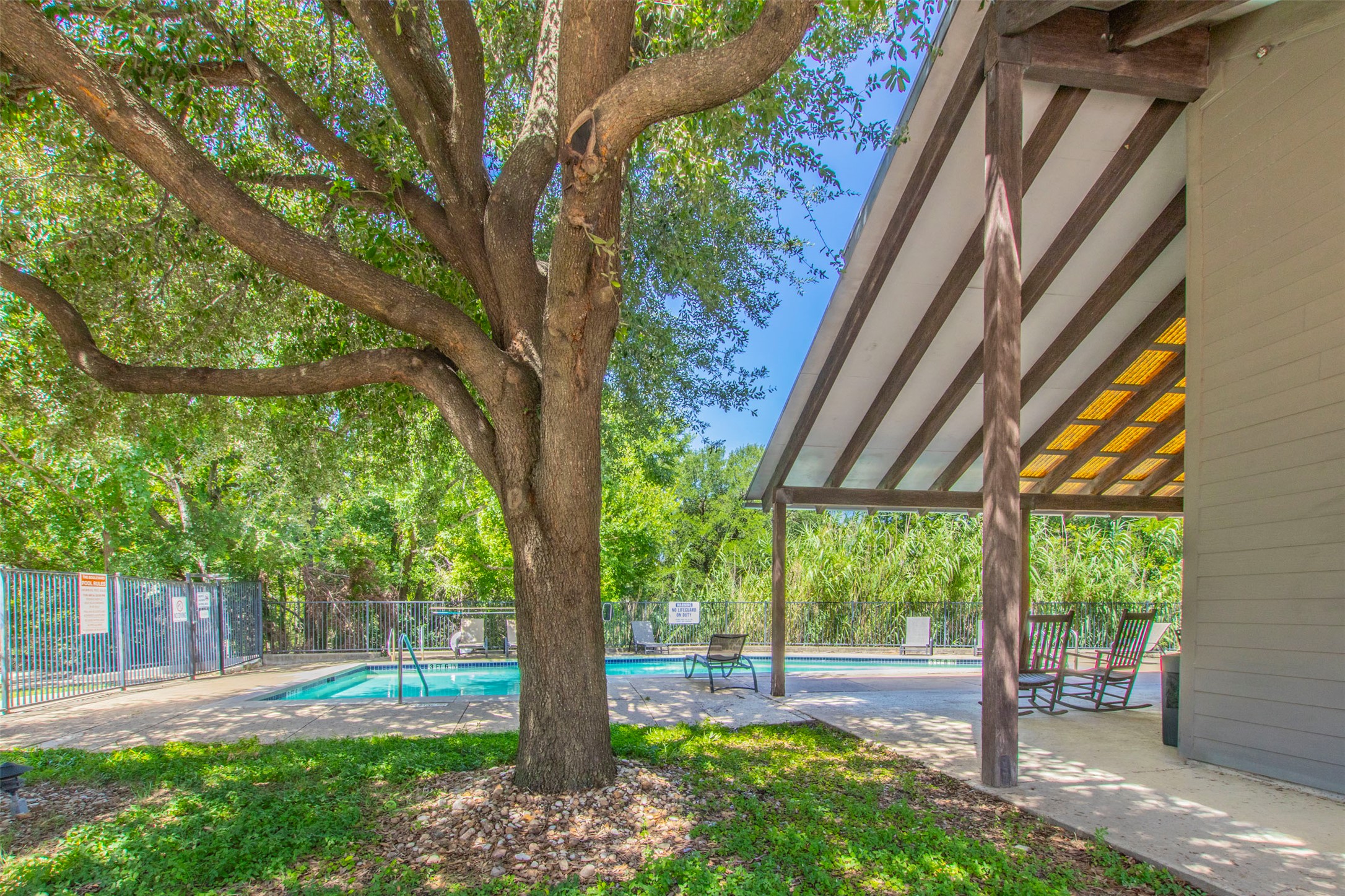 1201 Grove Boulevard, Unit 702 Austin, TX 78741 - Photo 18 of 19 a front view of a house with garden