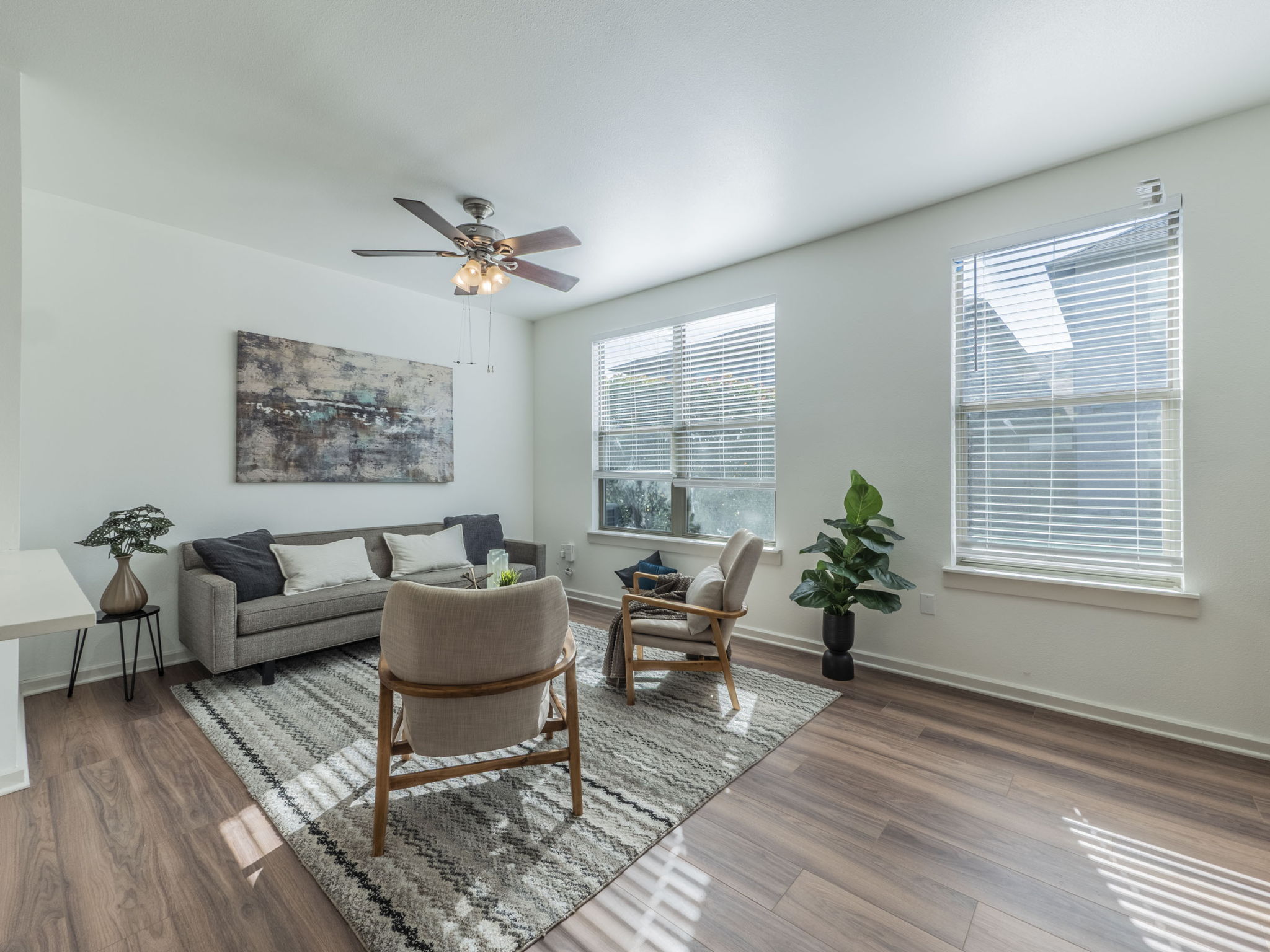 1201 Grove Boulevard, Unit 702 Austin, TX 78741 - Photo 3 of 19 a living room with furniture ceiling fan and a window