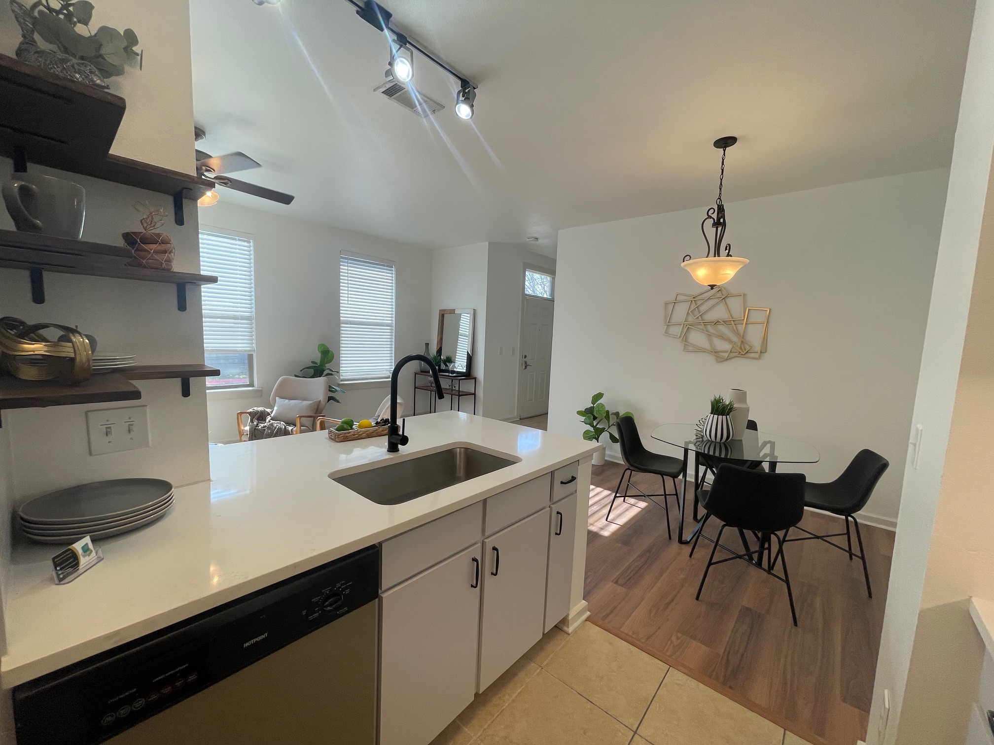 1201 Grove Boulevard, Unit 702 Austin, TX 78741 - Photo 6 of 19 a kitchen with a sink and stove