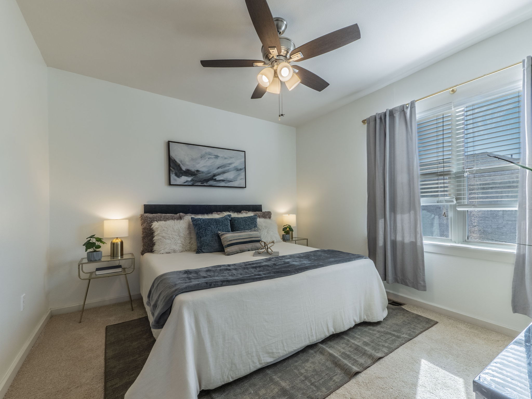 1201 Grove Boulevard, Unit 702 Austin, TX 78741 - Photo 9 of 19 a bedroom with a large bed and a window