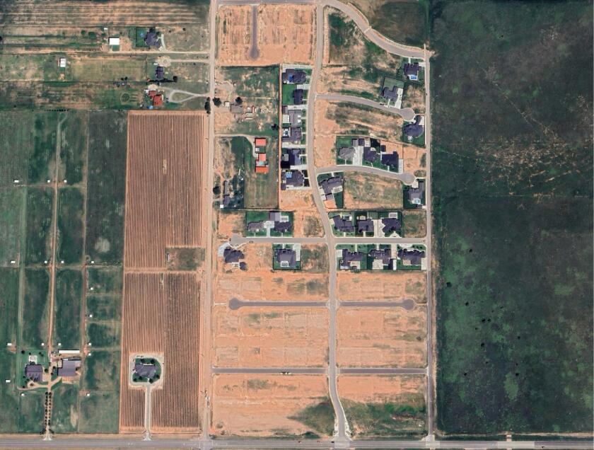 7734 45th Street Lubbock, TX 79407 - Photo 3 of 4 a picture of a bathroom with a shower