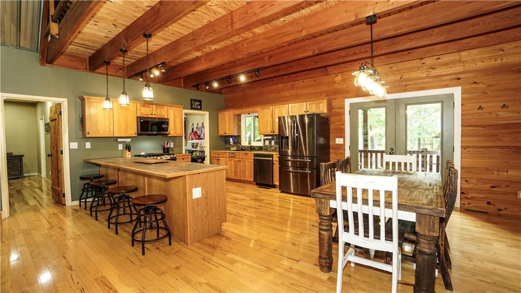 169 Williams Road Taylorsville, GA 30178 - Photo 12 of 84 a kitchen with lots of counter and chairs