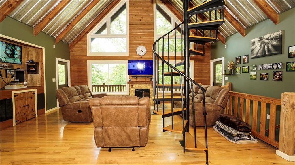 169 Williams Road Taylorsville, GA 30178 - Photo 20 of 84 a living room with furniture and a floor to ceiling window