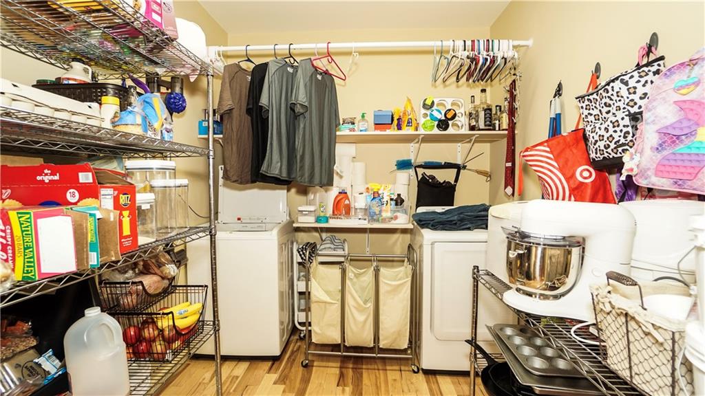 169 Williams Road Taylorsville, GA 30178 - Photo 58 of 84 a view of walk in closet with clothes and shoes