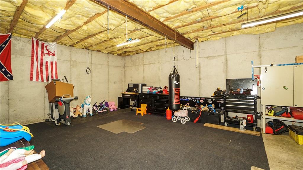 169 Williams Road Taylorsville, GA 30178 - Photo 61 of 84 a view of a garage with rack and bicycle