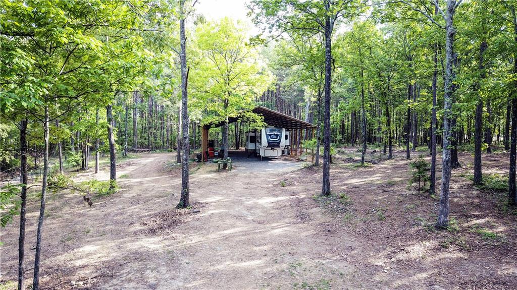 169 Williams Road Taylorsville, GA 30178 - Photo 75 of 84 a view of outdoor space with deck and yard