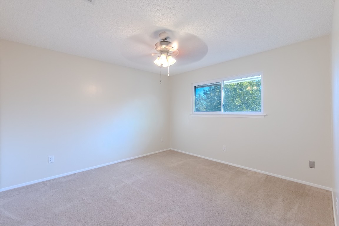 8203 Beaver Brook Lane Austin, TX 78748 - Photo 26 of 34 an empty room with a window