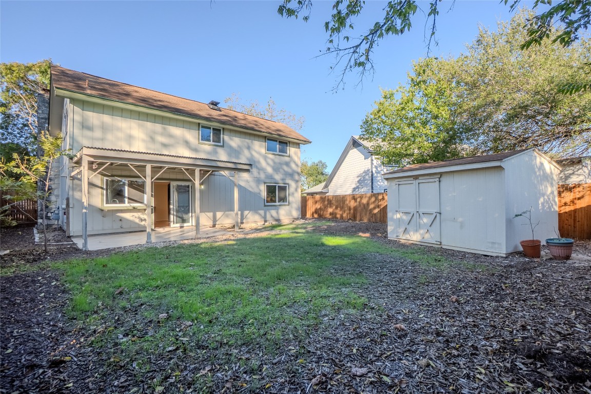 8203 Beaver Brook Lane Austin, TX 78748 - Photo 32 of 34 a view of a house with a backyard
