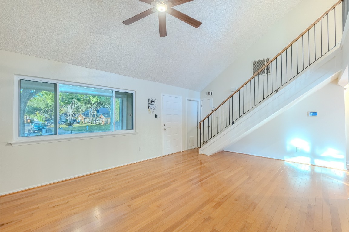 8203 Beaver Brook Lane Austin, TX 78748 - Photo 5 of 34 a view of empty room with wooden floor
