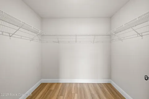 a view of a room with racks on the wall