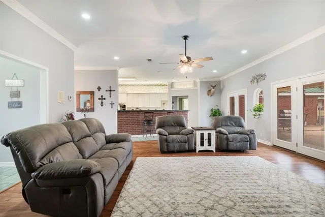 a bathroom with a sink and a large mirror