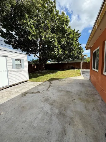 a view of outdoor space and yard