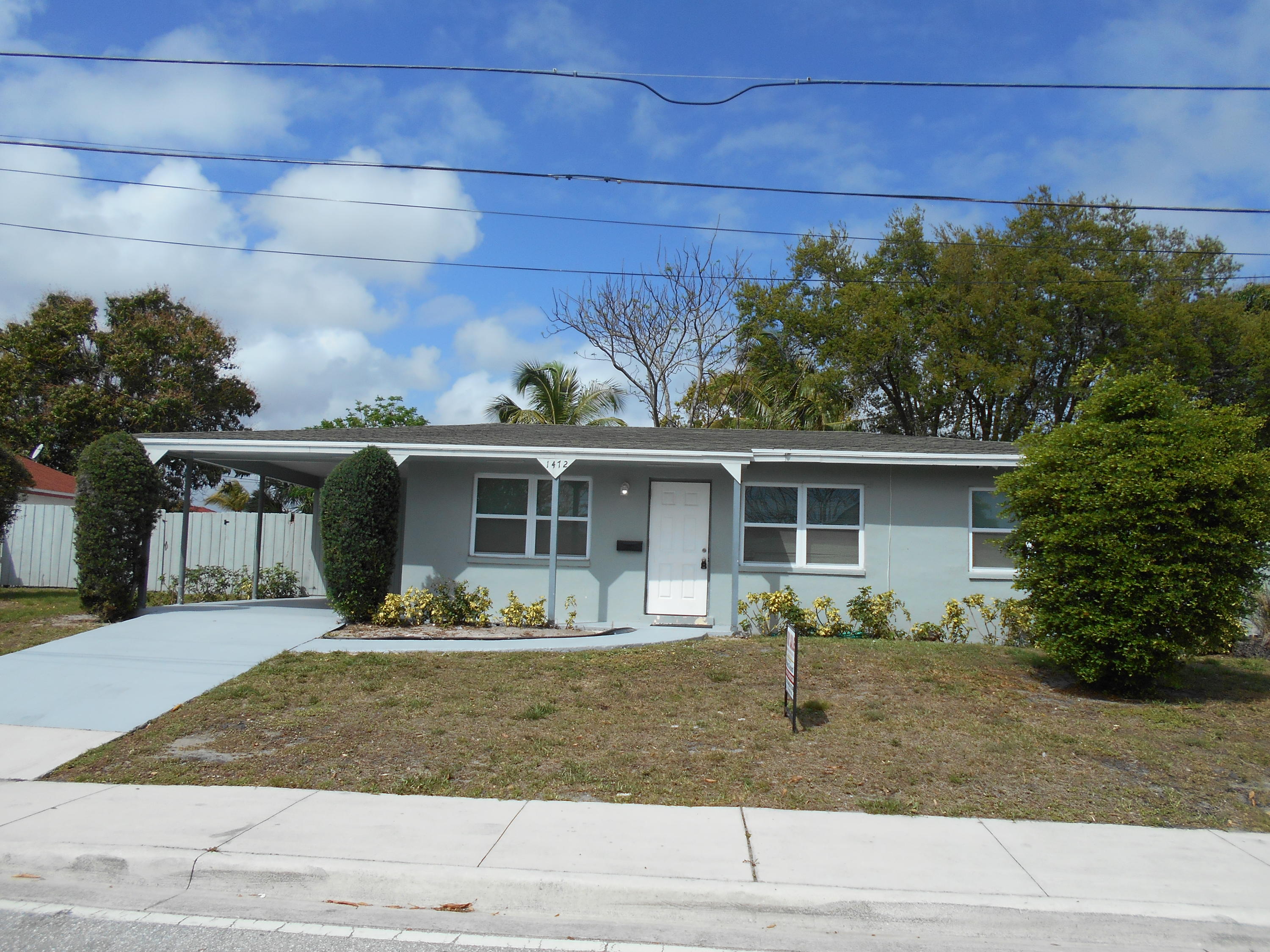 1472 West 35th Street Riviera Beach, FL 33404 - Photo 1 of 10 FRONT