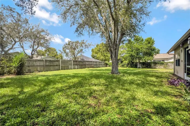 a view of outdoor space with deck and garden