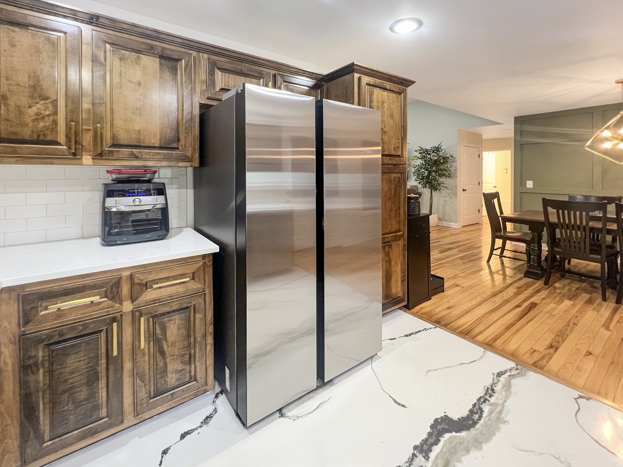 319 Wynns Ferry Road Dover, TN 37058 - Photo 13 of 27 a kitchen with stainless steel appliances granite countertop a refrigerator a stove and a sink with cabinets