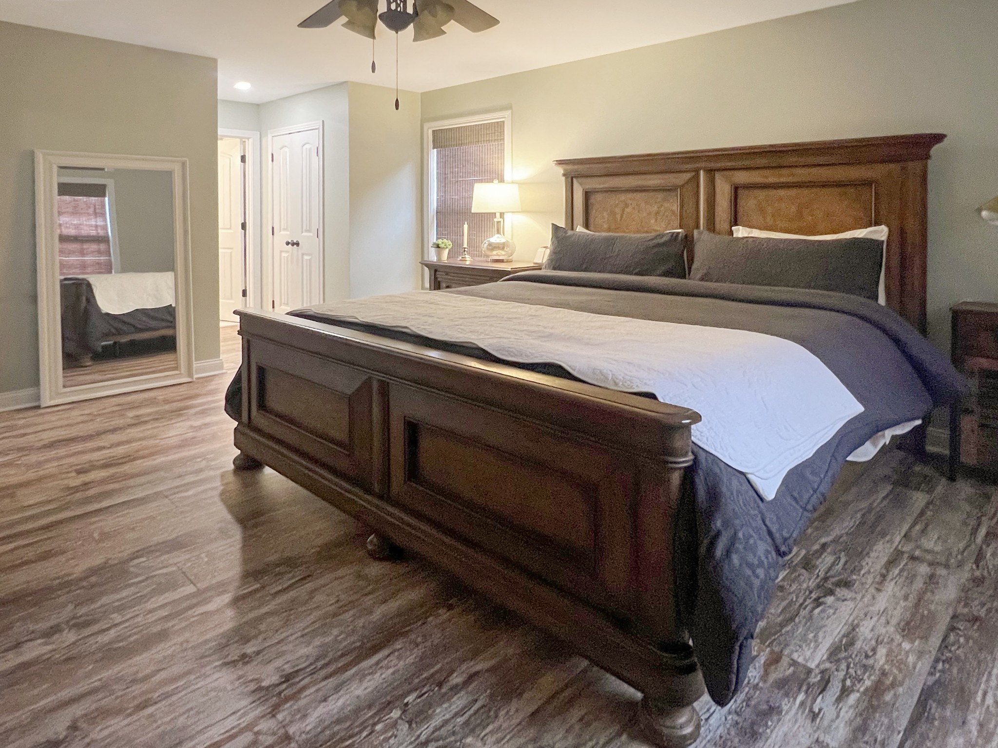 319 Wynns Ferry Road Dover, TN 37058 - Photo 15 of 27 a bedroom with a bed and wooden floor