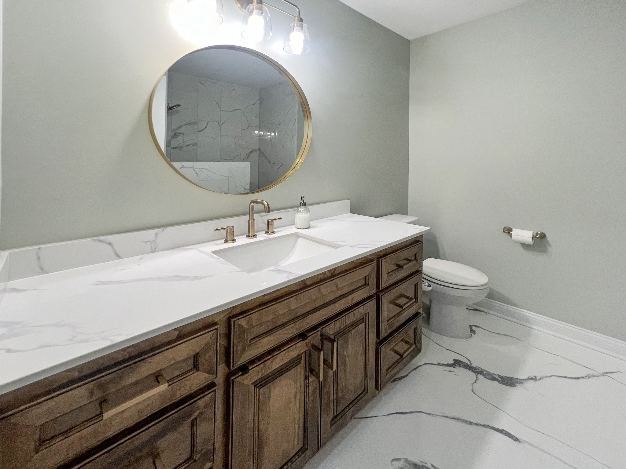 319 Wynns Ferry Road Dover, TN 37058 - Photo 16 of 27 a bathroom with a sink a toilet and a mirror
