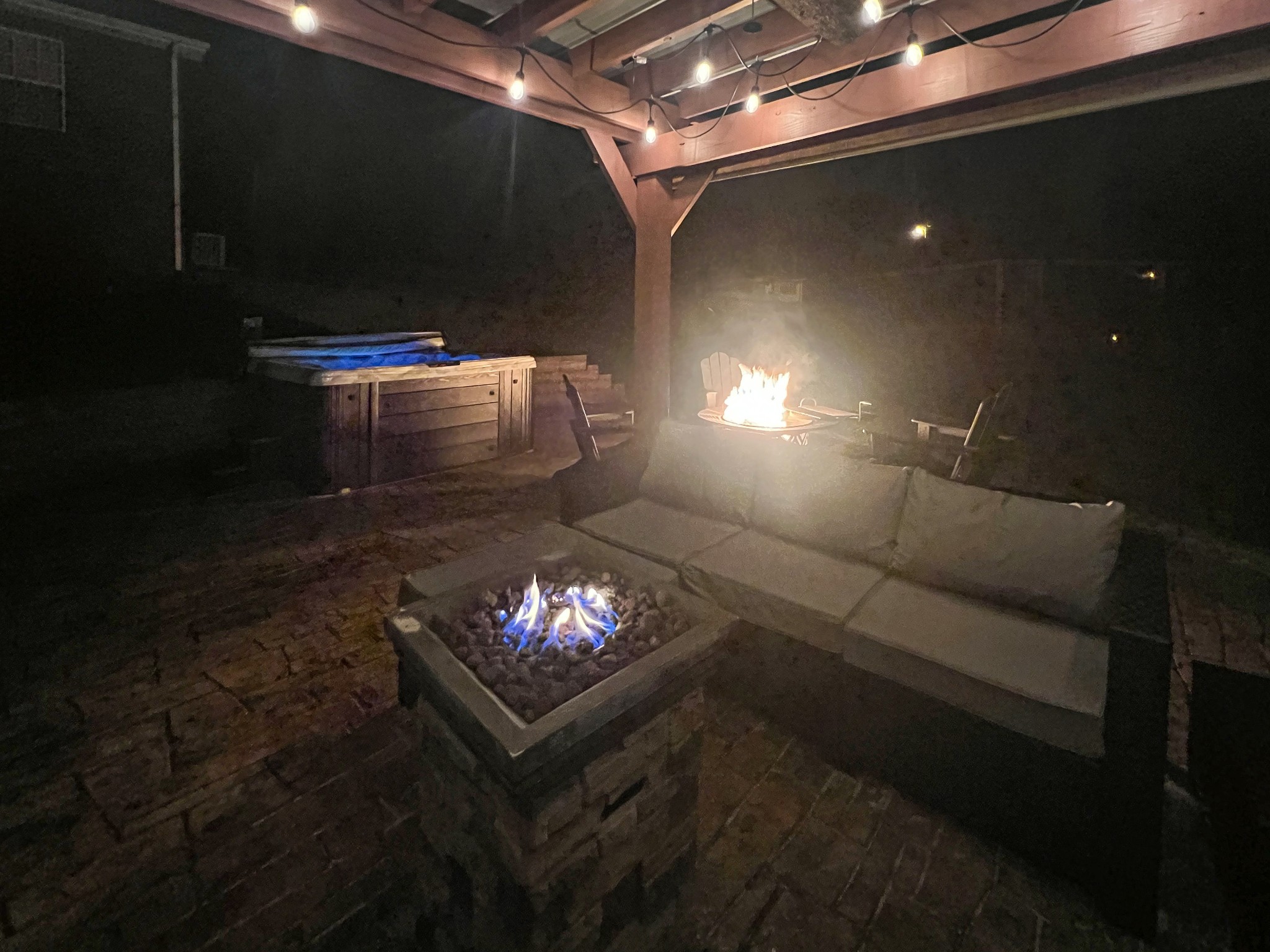 319 Wynns Ferry Road Dover, TN 37058 - Photo 25 of 27 a living room with furniture a fireplace and a flat screen tv