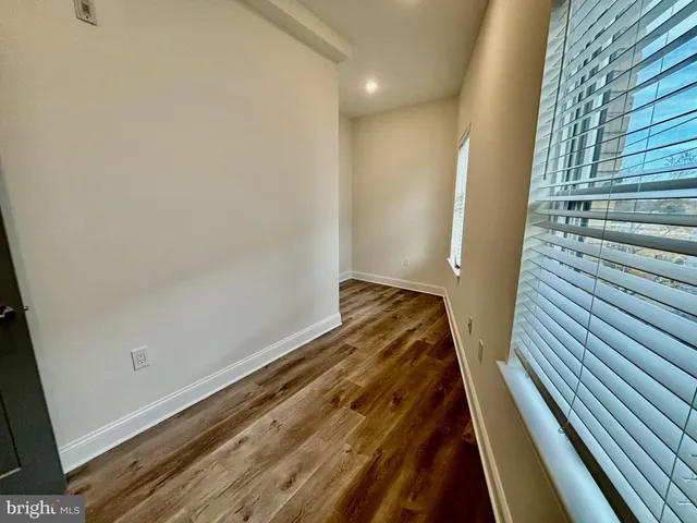 a view of wooden floor in a bathroom