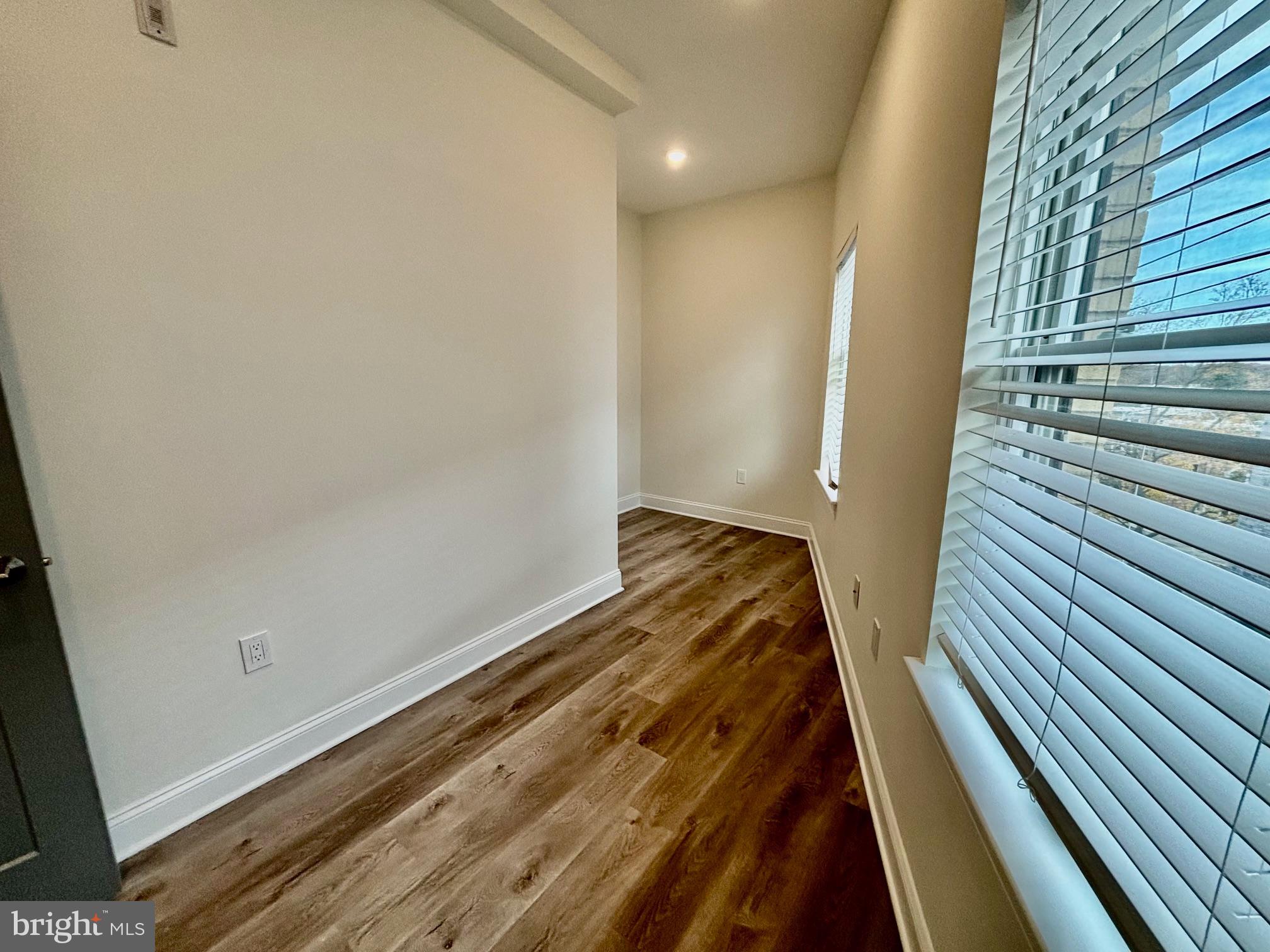 6601 Ridge Avenue, Unit D Philadelphia, PA 19128 - Photo 9 of 10 a view of wooden floor in a bathroom