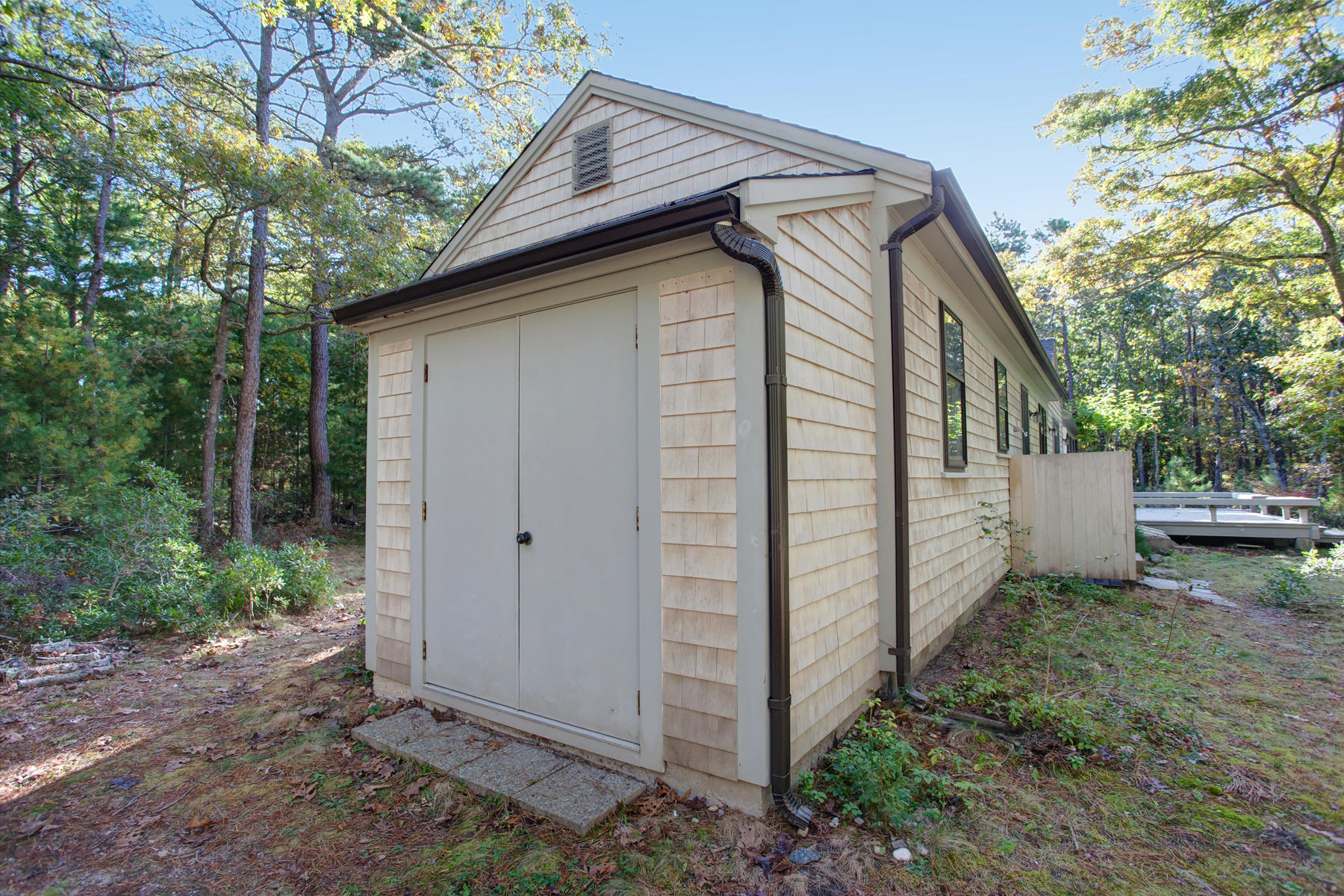 21 Lowell Road Cotuit, MA 02635 - Photo 38 of 49 Side with storage