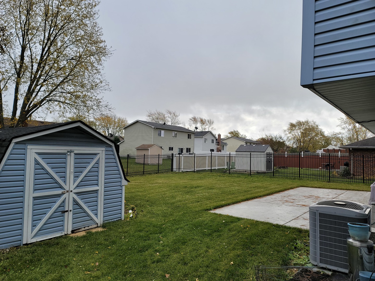 139 Pheasant Road Matteson, IL 60443 - Photo 2 of 2 a view of a back yard of the house with a yard