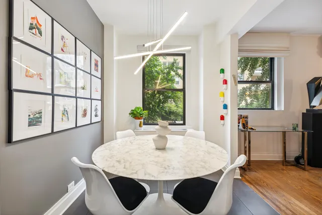 a kitchen with stainless steel appliances granite countertop a stove microwave and sink