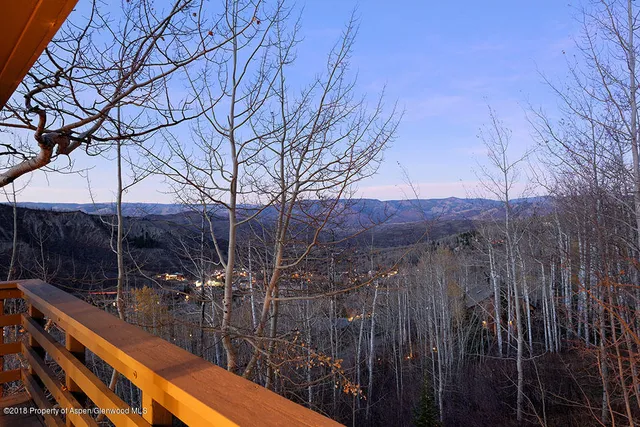 a view of a balcony with an outdoor space