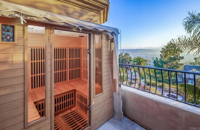 a view of staircase with a small yard