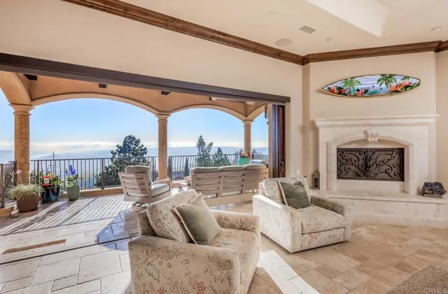 a large kitchen with stainless steel appliances granite countertop a lot of counter space and a sink