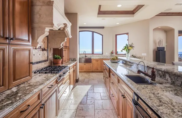 a kitchen with a sink and a window