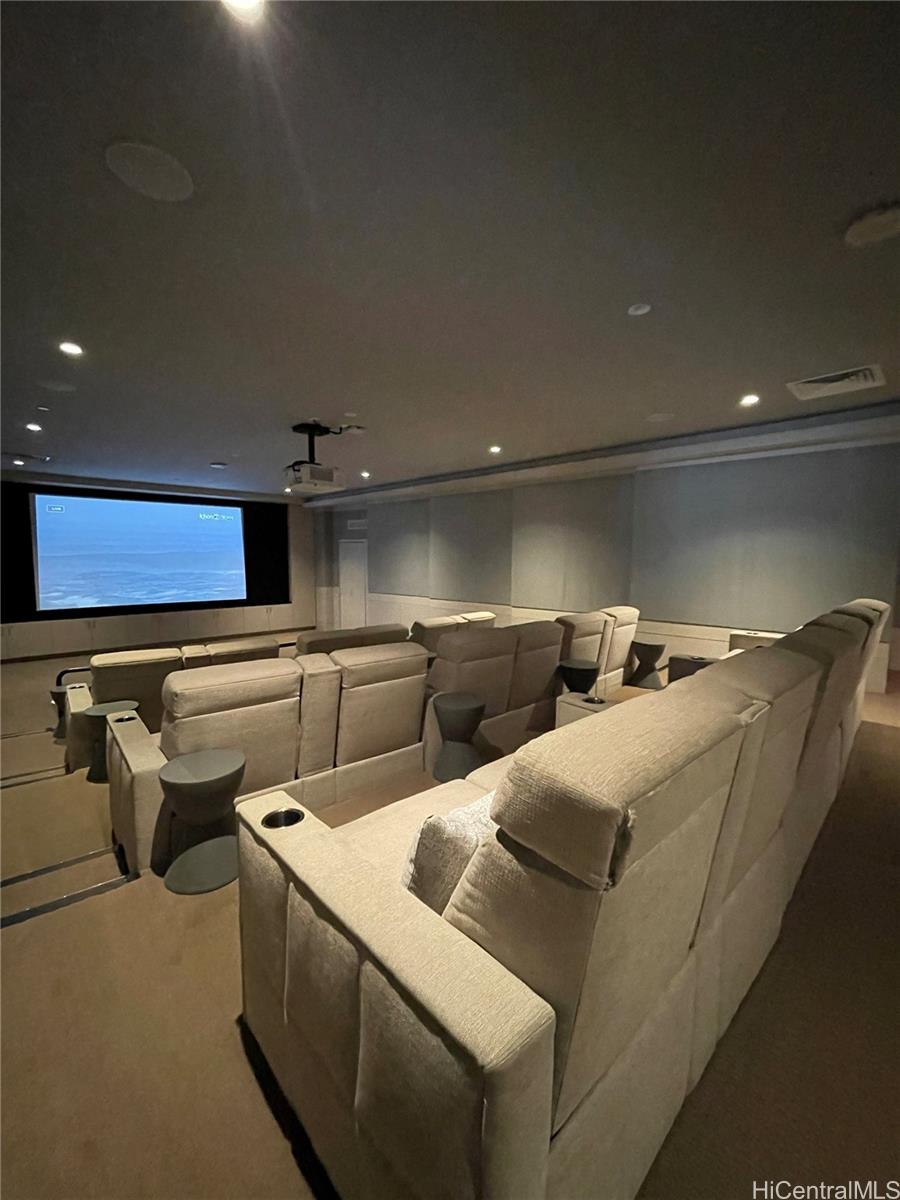 1108 Auahi Street, Unit PH3403 Honolulu, HI 96814 - Photo 20 of 24 a living room with furniture and a rug