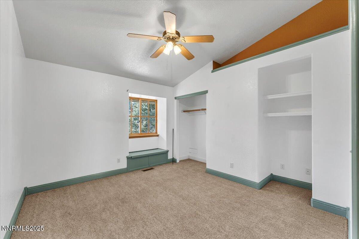 21410 Sazarac Road Reno, NV 89521 - Photo 13 of 41 an empty room with closet and fan