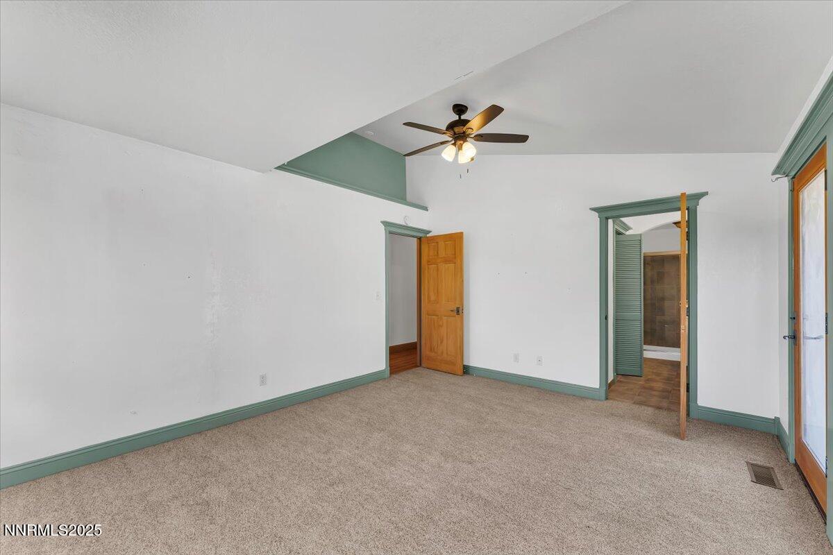 21410 Sazarac Road Reno, NV 89521 - Photo 16 of 41 a view of room with a ceiling fan and a ceiling fan