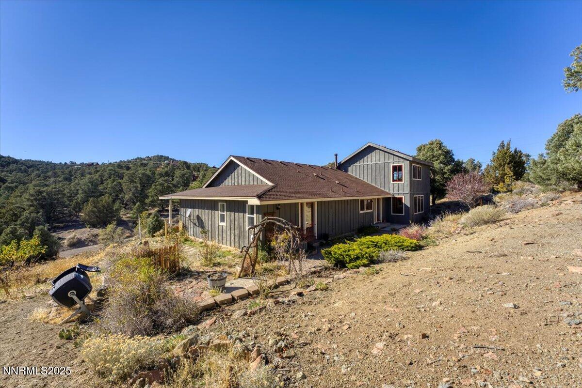 21410 Sazarac Road Reno, NV 89521 - Photo 22 of 41 a view of a house with a yard