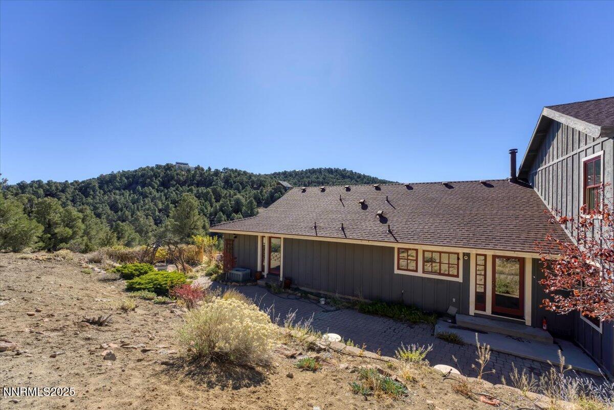 21410 Sazarac Road Reno, NV 89521 - Photo 23 of 41 a view of a house with a yard