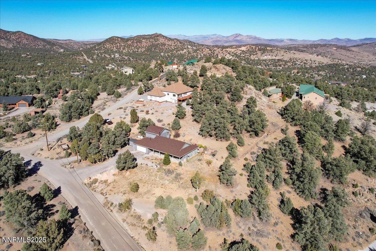 21410 Sazarac Road Reno, NV 89521 - Photo 27 of 41 an aerial view of mountain with residential trees