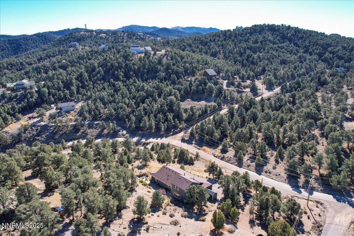 21410 Sazarac Road Reno, NV 89521 - Photo 31 of 41 an aerial view of house with yard and mountain view in back