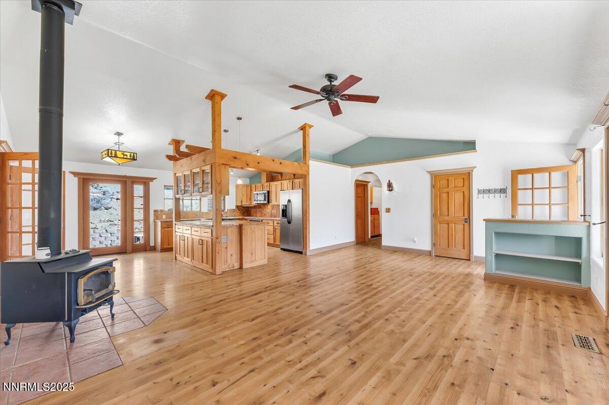21410 Sazarac Road Reno, NV 89521 - Photo 5 of 41 a view of a living room and a kitchen